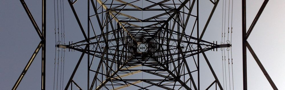 Lattice structure of electricity pylon viewed from underneath