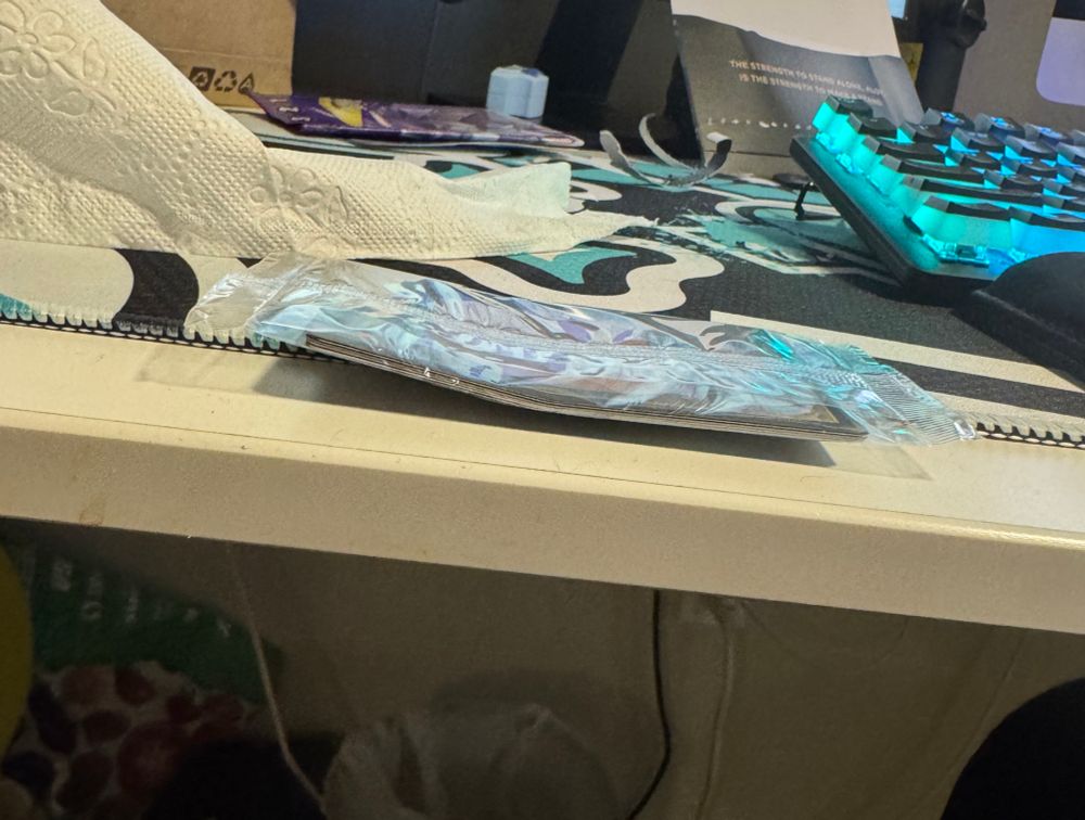 A photo of an extremely bent MTG secret lair 