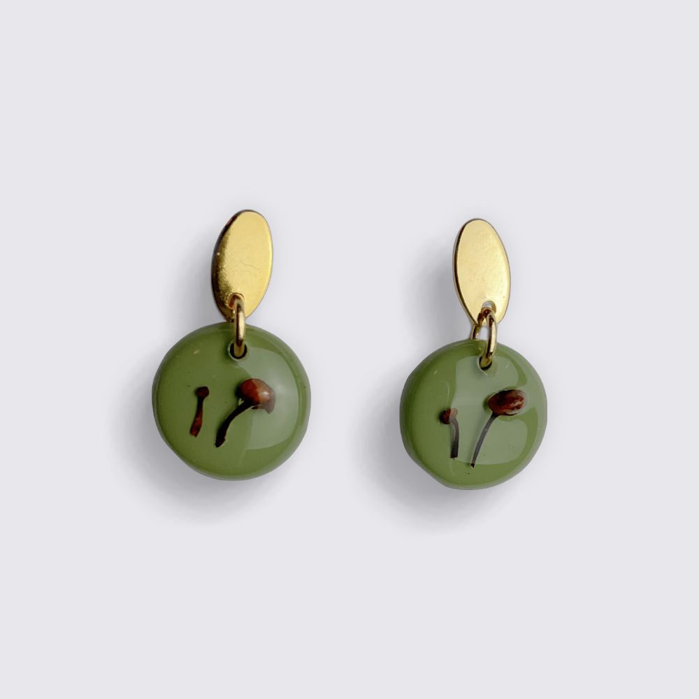 Real preserved mushrooms on green dangly earrings