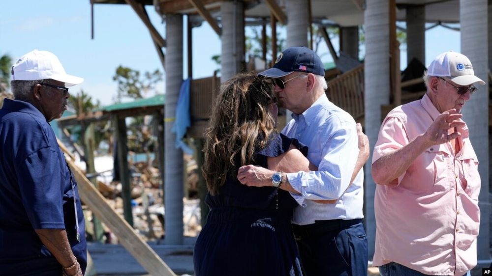 President Joe Biden hugs a woman in Keaton Beach, Florida, during his tour of areas impacted by Hurricane Helene, Oct. 3, 2024. https://www.google.com/url?sa=i&url=https%3A%2F%2Fwww.voanews.com%2Fa%2Fbiden-surveys-hurricane-helene-s-damage-in-southeastern-us-states-%2F7809719.html&psig=AOvVaw3qtk8CG2WvJe8ue1BXC4Z4&ust=1754876025578000&source=images&cd=vfe&opi=89978449&ved=0CBYQjRxqFwoTCNjUmemM_44DFQAAAAAdAAAAABAE
