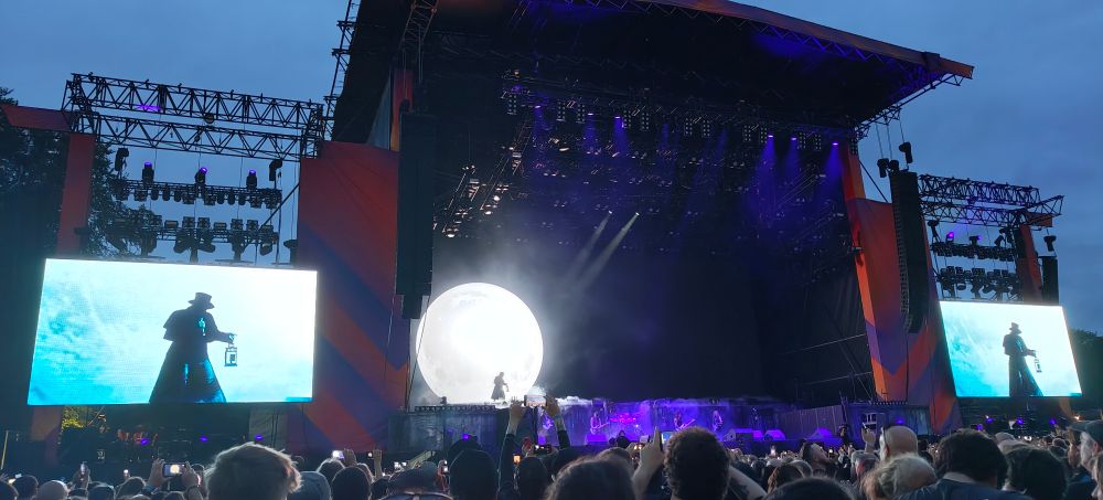 A photo from Iron Maiden concert. They're singing Fear Of The Dark.
