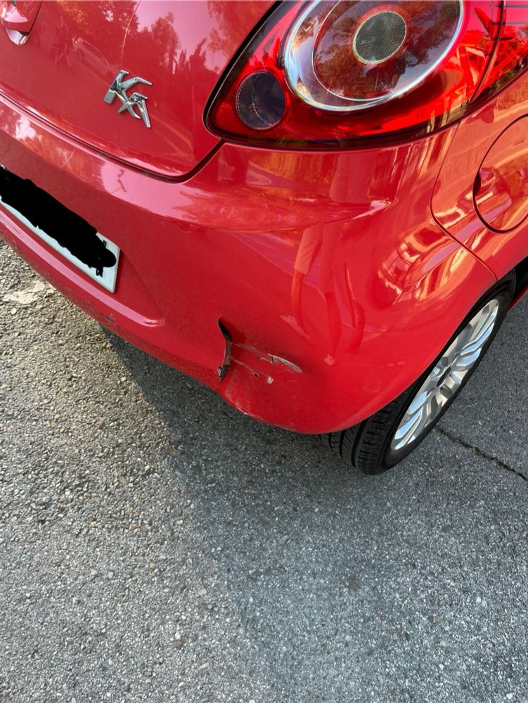 The back of my Ford Ka, with a dent :(