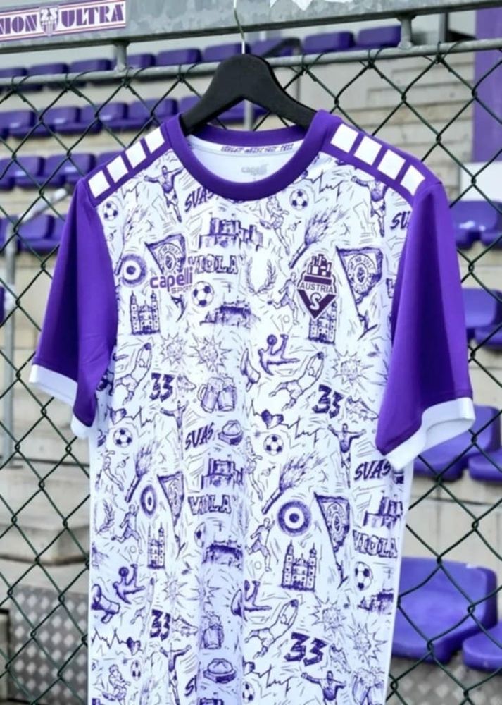 White jersey with purple sleeves and purple doodles on torso