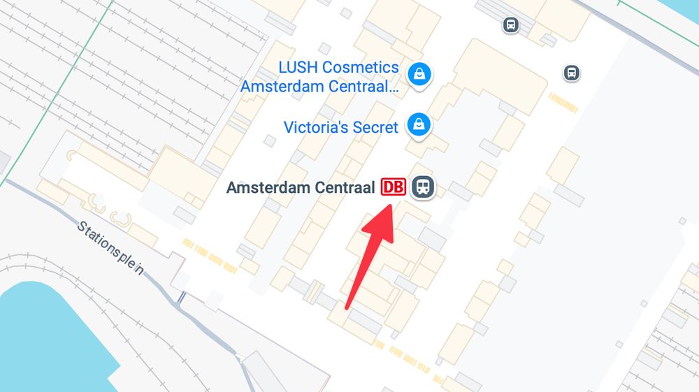 Screenshot from Google Maps showing the name "Amsterdam Centraal" followed by a logo of Deutsche Bahn.