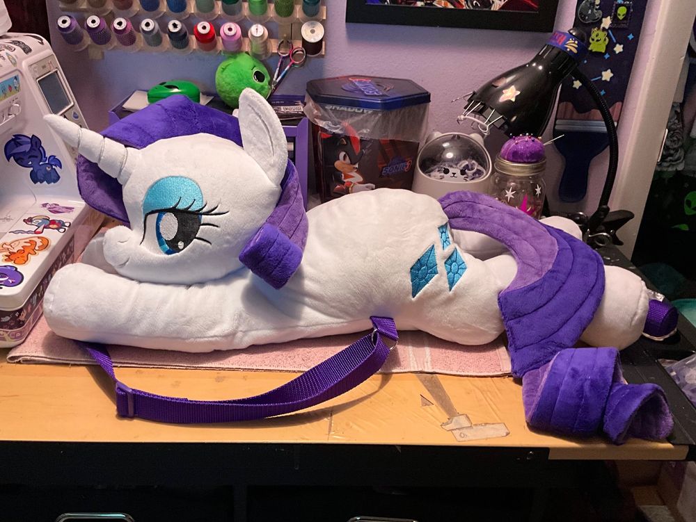 A large handmade plush backpack of Rarity from My Little Pony.