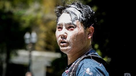 half-assed alt-right bitch "influencer" andy ngo with a face full of milkshake, finding out and looking sad after fucking around in portland, OR