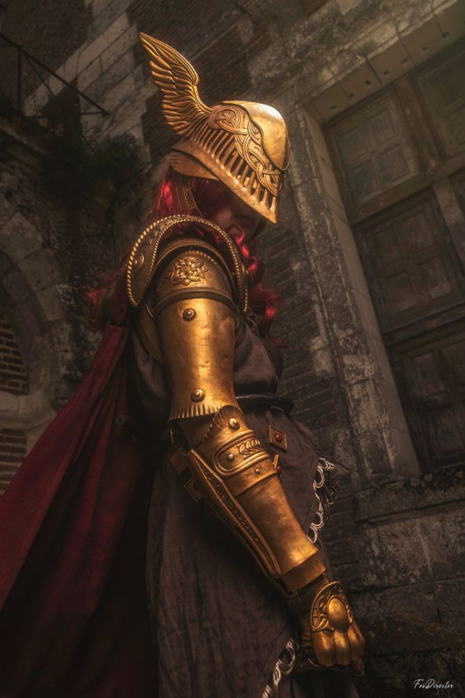 Malenia cosplay in front of a building