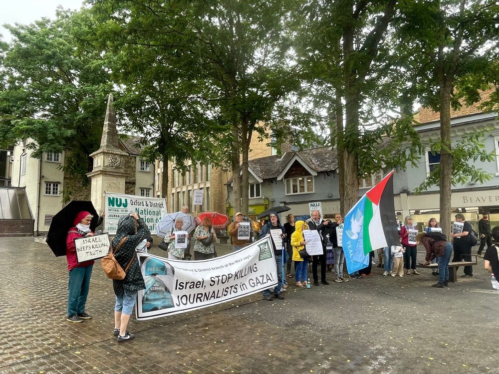 NUJ protest at Bonn Square with flags