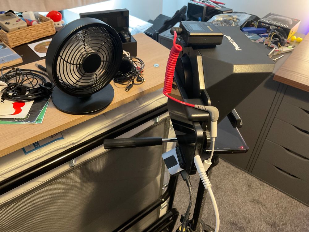 fan cooling an iphone 12 which is not capable of cooling itself adequately.