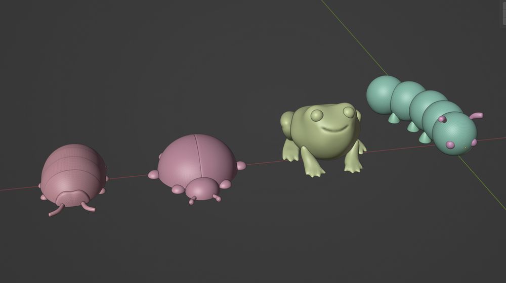 Screenshot of Blender viewport. There are 4 chunky critters. isopod, ladybug, frog, and caterpillar. 