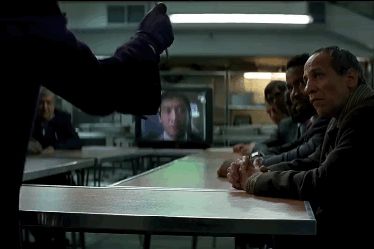 Scene from Batman: The Dark Knight. The Joker sticks a pencil into the desk. When a gangster approaches the Joker, he slams the guy’s head into the pencil. The gangster falls to the floor. 

For the record, this is one of the best movie scenes ever made. 
