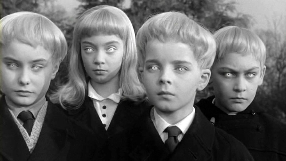 Still photo from the film “Village of the Damned” showing children with glowing eyes