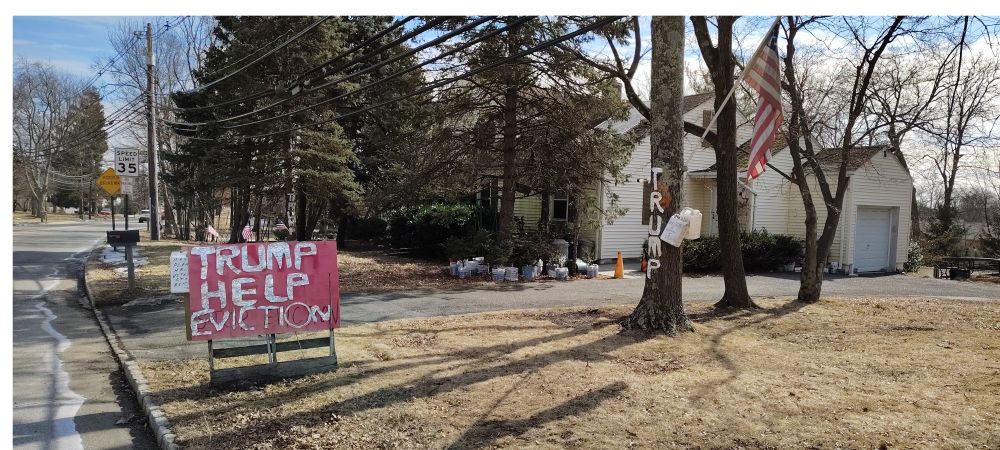 Yard signs of trump supporter who is being evicted (Feb 25, 2025)