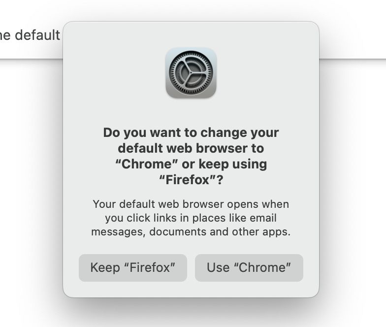 Screenshot of the "change your default browser" dialog with a choice between Chrome and Firefox.