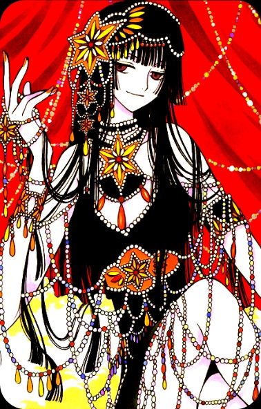 Picture of Yuko Ichigara from the series xxxHolic. She is sitting in a black dress, dripping in beautiful beads and jewelry. 