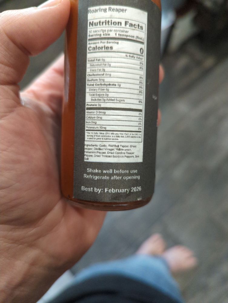 Ingredients: Garlic, Red Bell Pepper, Ghost pepper, distilled vinegar, yellow onion, habanero pepper, dried Carolina reaper pepper, dried Trinidad scorpion pepper, sea salt