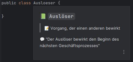 Code with class Ausloeser with Contextive hover panel showing term "Auslöser", definition "Vorgang, der einen anderen bewirkt" and usage example "Der Auslöser bewirkt den Beginn des nächsten Geschäftsprozesses"