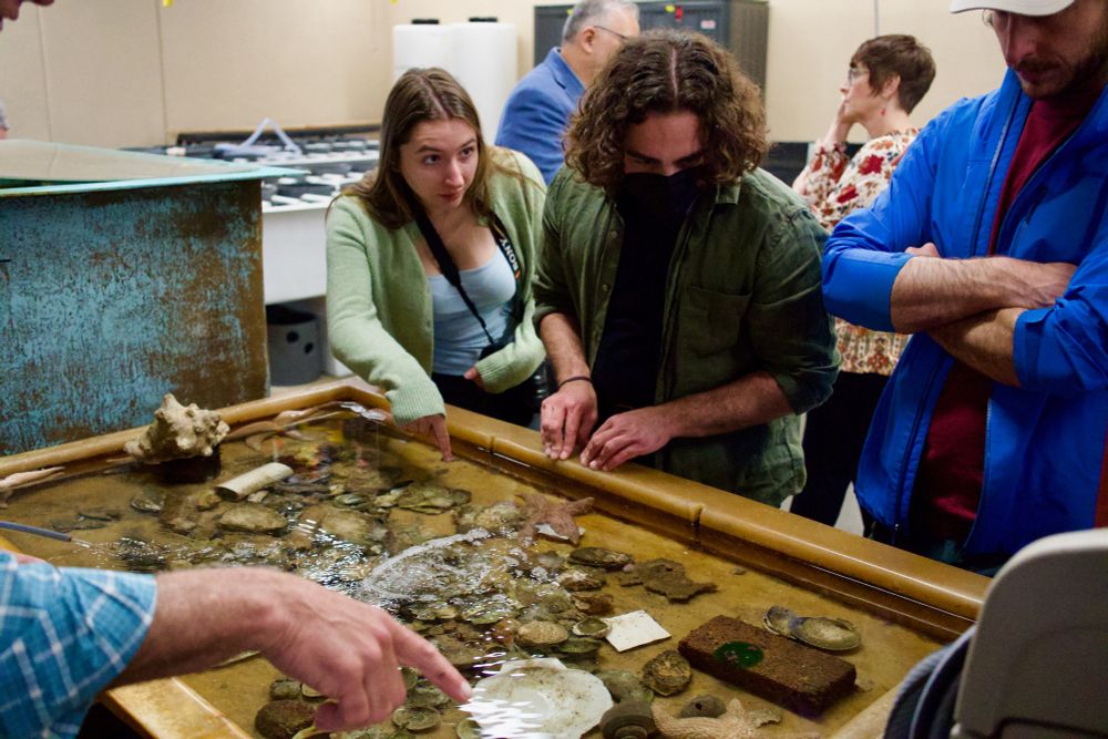 Fellows learning about bivalves with Ed Baker