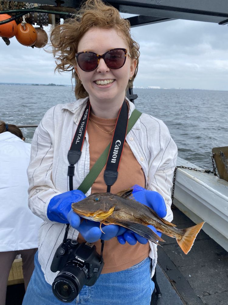 AWJ fellow holding a fish