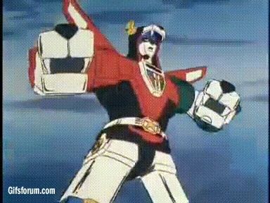 Voltron: Defender of the Universe (1984), forms blazing sword and gets into attack position!