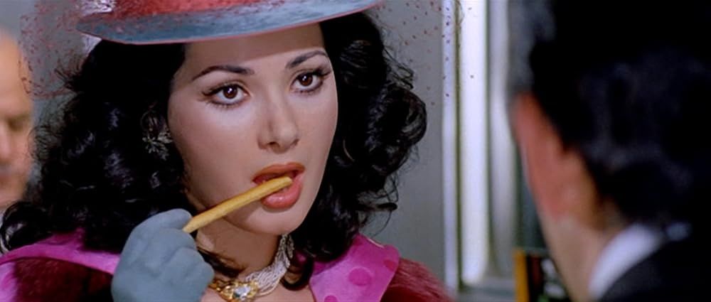A screenshot of Edwige Fenech from the movie Giovannona Long-Thigh 1973