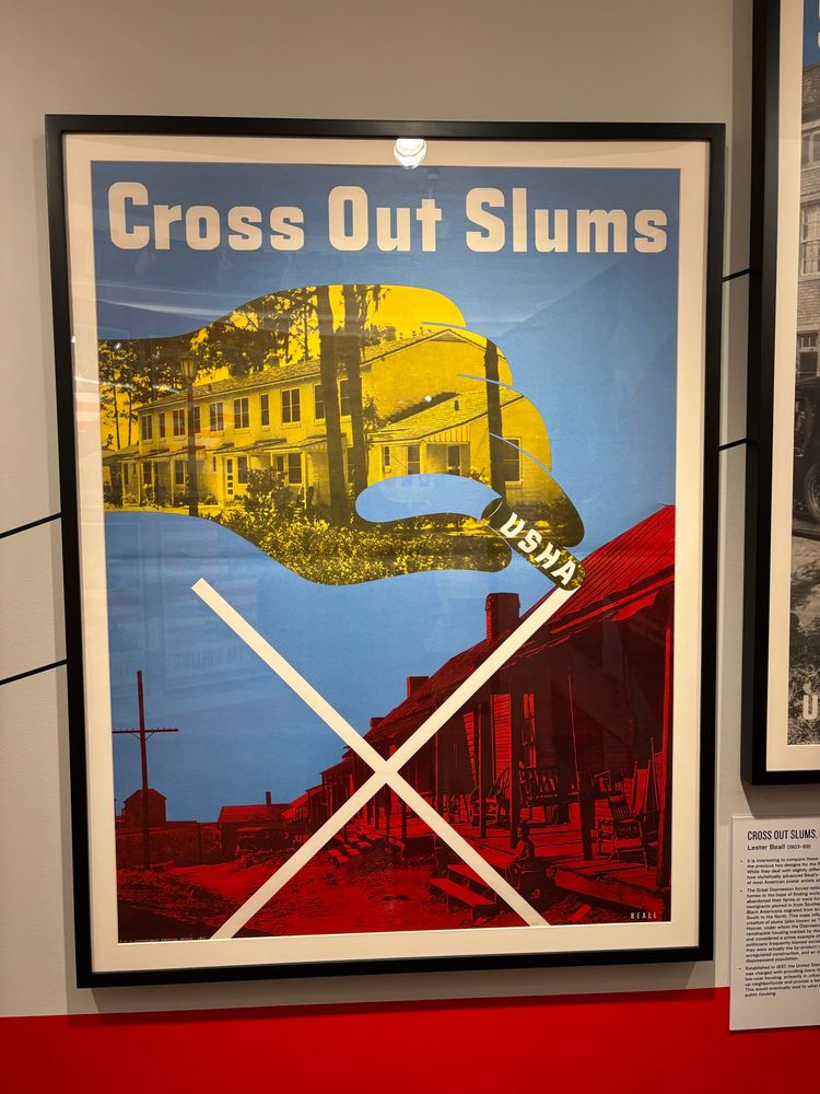 US Housing Authority poster with a hand using a piece of chalk marked “USHA” to cross out dilapidated rural housing.