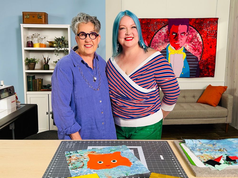 Sarah and Susan Brubaker Knapp, host of QA TV, standing on set