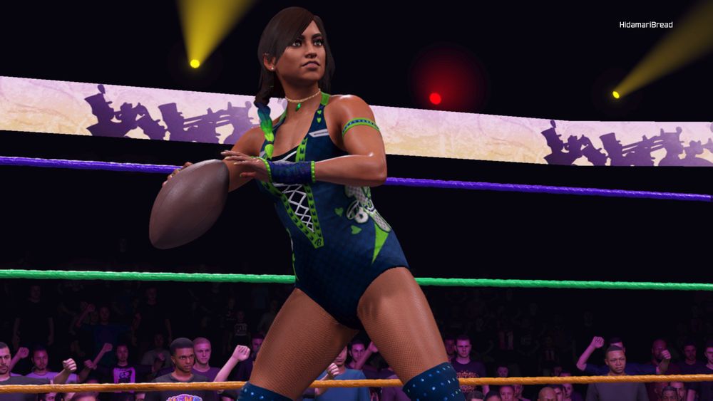 Hana Brightly getting ready to throw what is undoubtedly going to be an interception because she has no arm strength. She looks good dressed in Seattle Seahawks colors though, so at least there's that. 