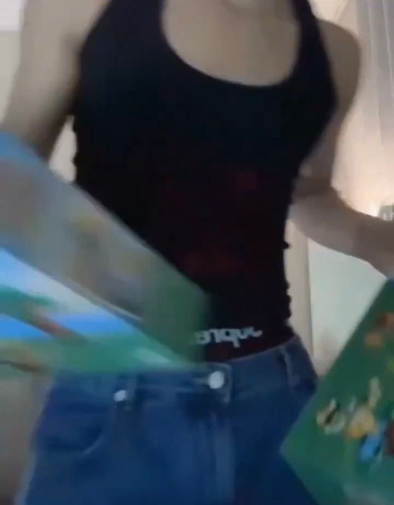ateez seonghwa in that live where he built animal crossing Legos, you can only see below his shoulders but he's wearing a black tank top. some have called it the hwanties live bc you CAN see the band of his underwear over his jeans lol