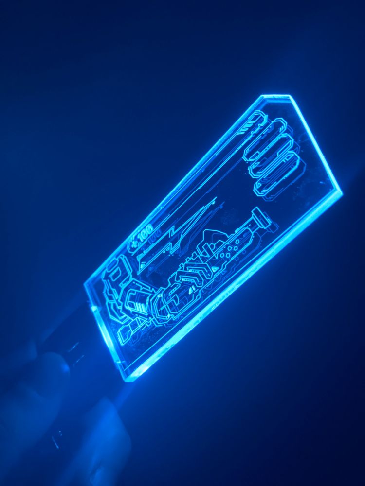 LED keychain of the Jackhammer lit in blue