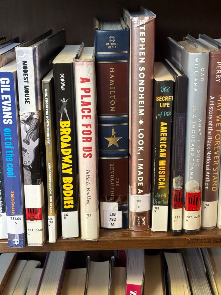 Books about musicals on a shelf at the New York public library 