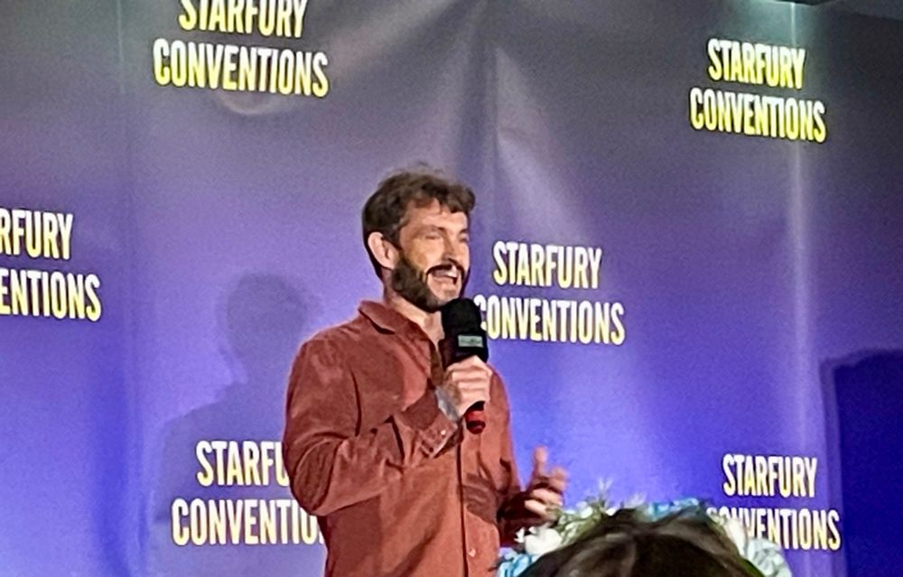 Hugh Dancy alone on stage