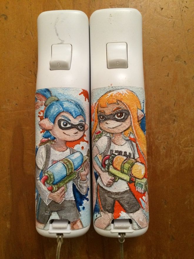 Watercolour illustrations on two wiimote covers, featuring the inkling boy and girl characters