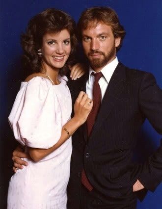 Margaret Colin and Justin Deas posing as their characters Margo Montgomery Hughes and Tom Hughes from the soap opera 'As the World Turns'.