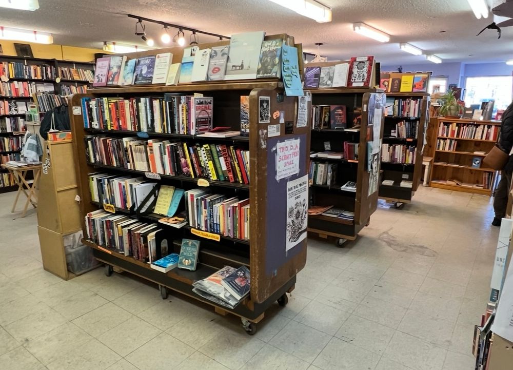 Shop showing the many book shelves of Spartacus Books. 