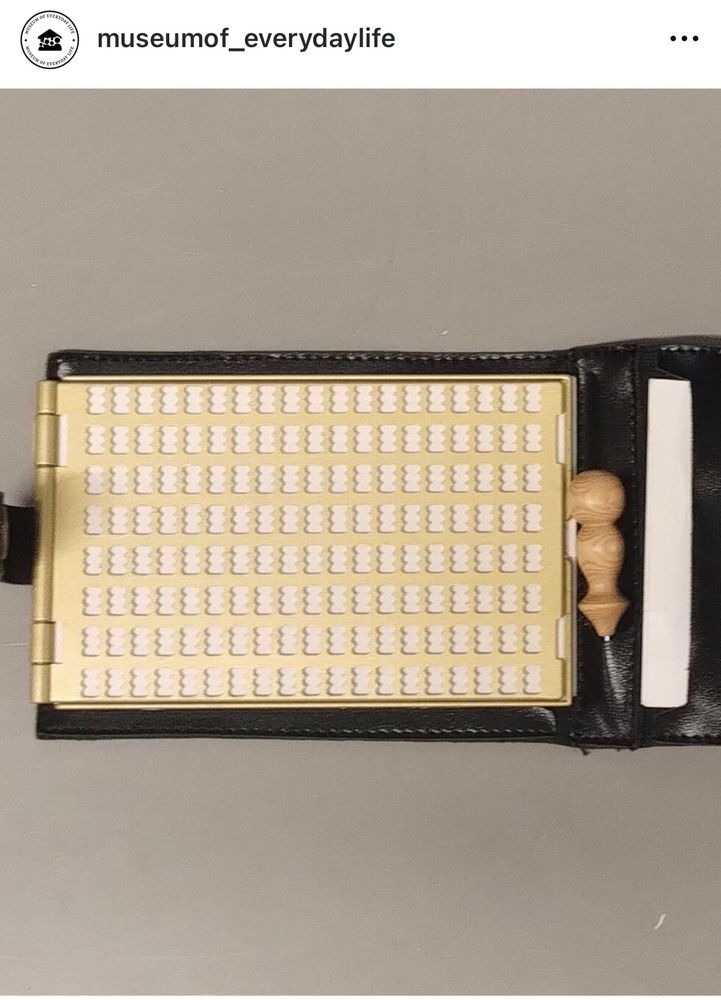 A Braille notepad. 