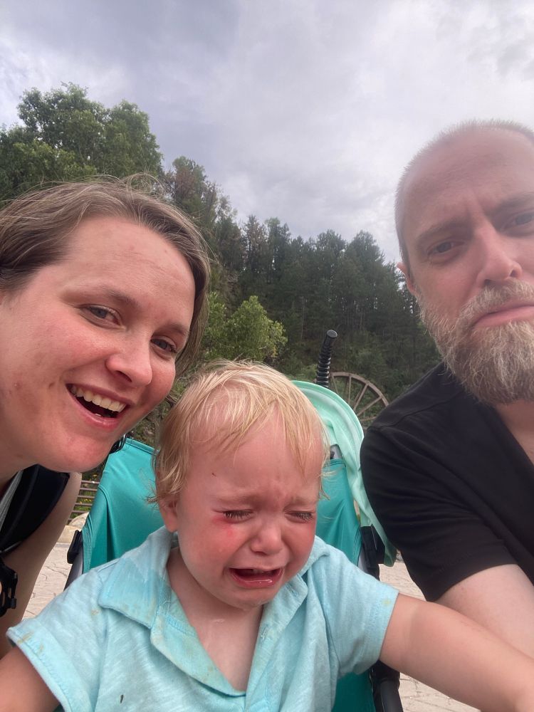 Mom and dad with crying baby 