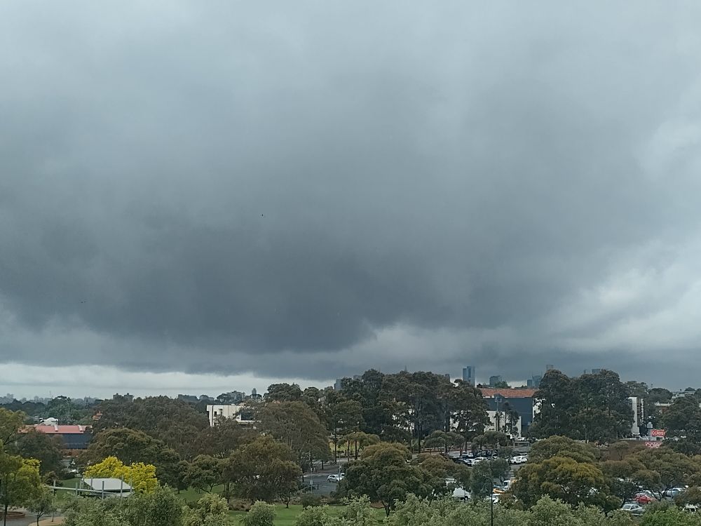 Dark clouds and rain rolling in over Melbourne Australia