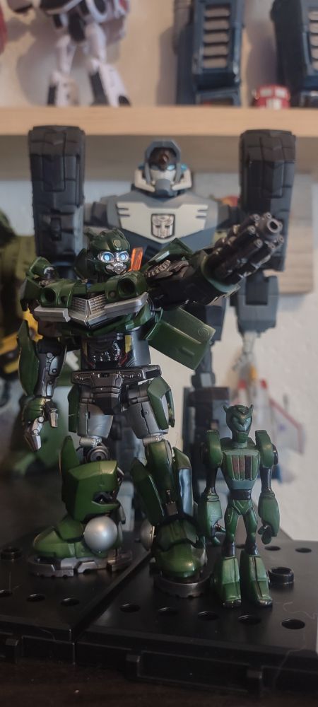 Green dyed BLOKEES rotb bumblebee as "wasp" with a much smaller wasp figure at his sideboy. Animated "Longarm" looms behind. "Don't frame me or my son for crimes ever again"