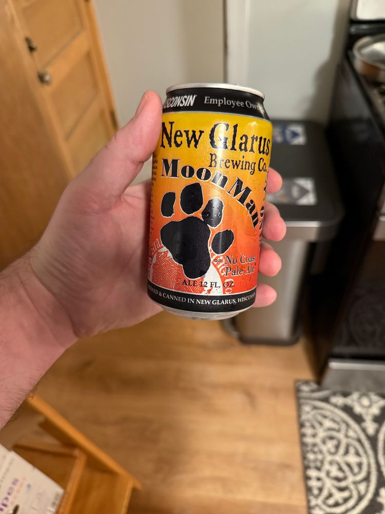 Me holding a can of Moon Man from New Glarus