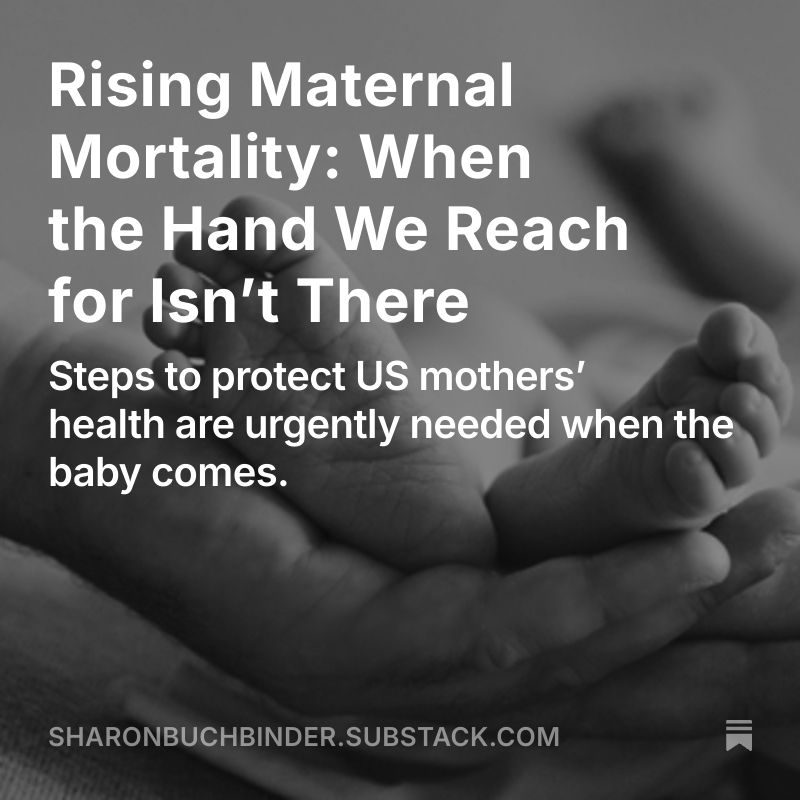 hands holding infant feet