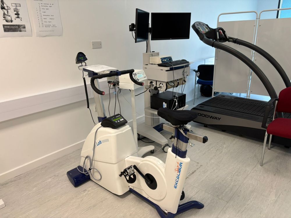 An exercise bike next to laboratory equipment.