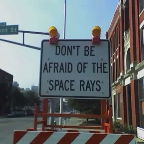 Sign reading, “Don’t be afraid of the space rays”