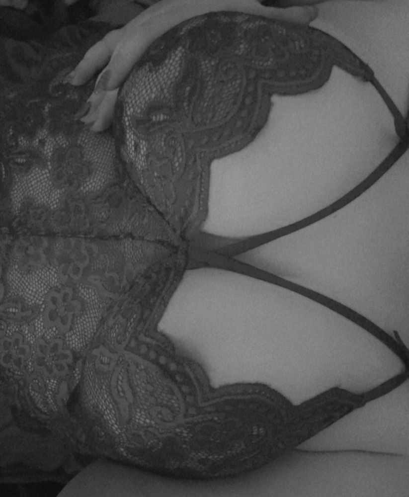 grace showing off her tits in lingerie in black and white 