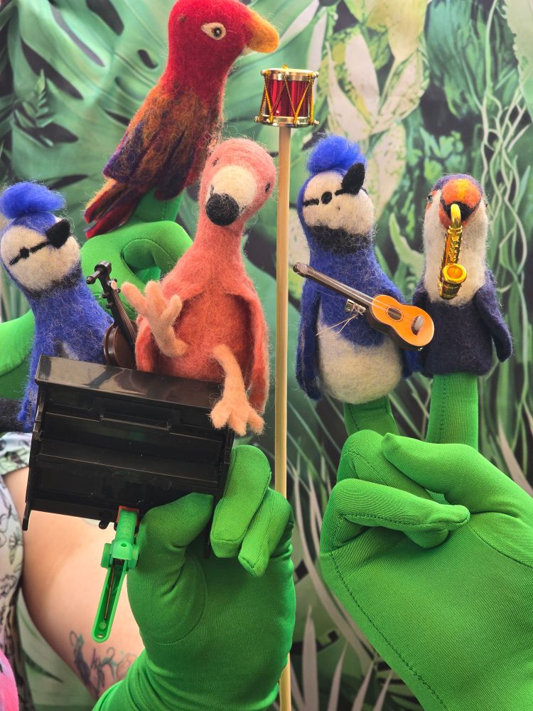 Bird puppets in a band