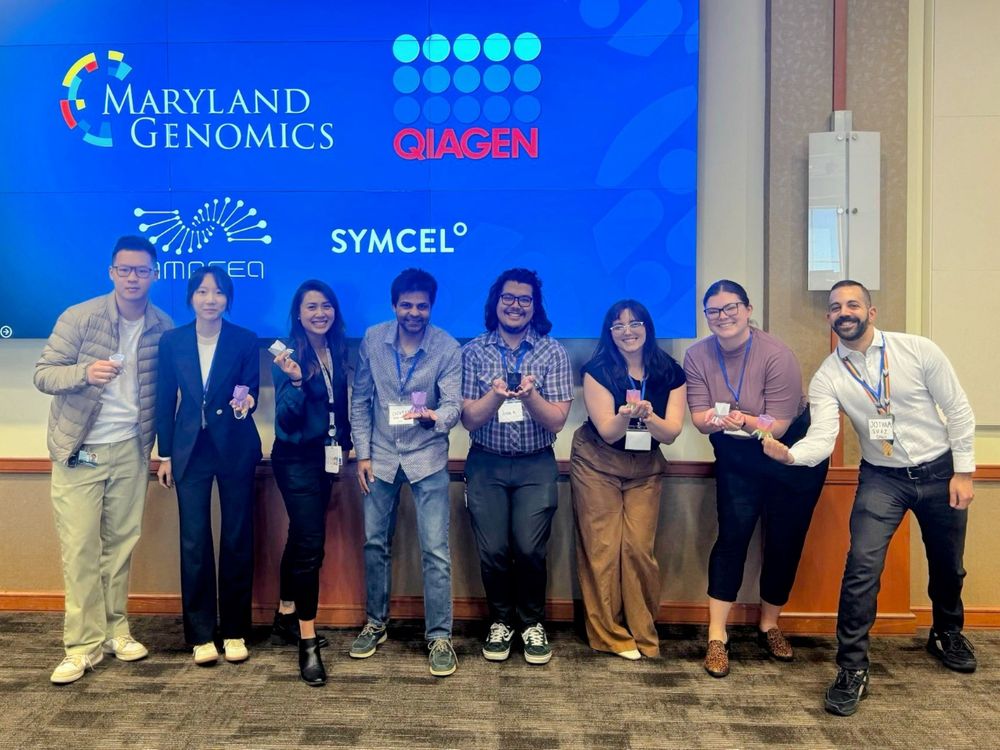 Two-thirds of the Suez Lab and one alumnus holding phage swag. From left: Jason, Yingying, Katti, Chinmay, Justin, Haley, Val, Jotham