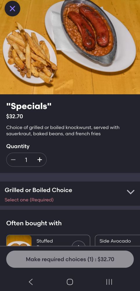 Knockwurst on baked beans with a side of fries, titled "specials" (the quotes are part of the title)