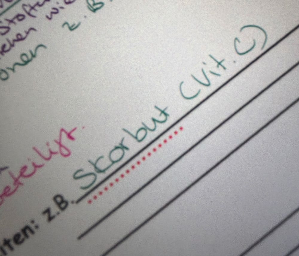 Picture of a part of a worksheet on vitamins. There is some handwriting and the word German word for scurvy, “Skorbut”, with the addition of (Vit. C) is handwritten in the centre. 