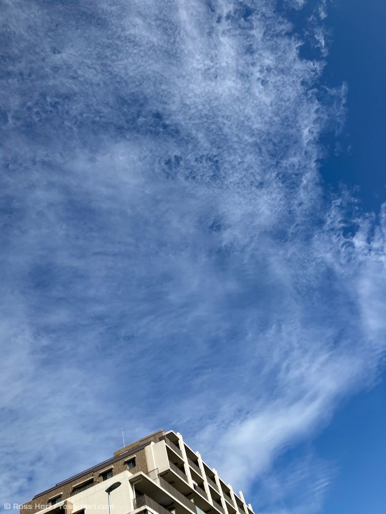 Thin clouds on a blue sky. Wispy. Translucent.