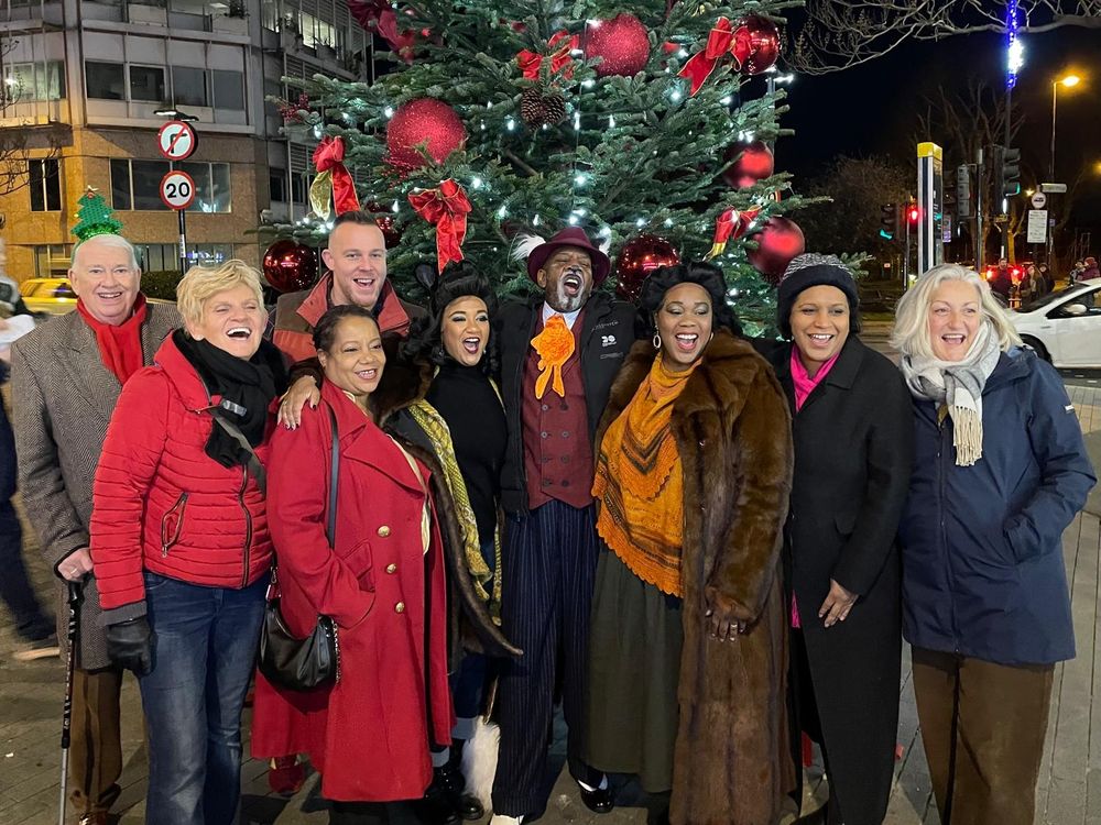 Janet Daby MP, Mayor of Lewisham Brenda Dacres, Cllr Louise Krupski, Cllr Eva Stamirowski, Cllr James-J Walsh, Cllr John Muldoon and carol singers at Catford Christmas lights switch on